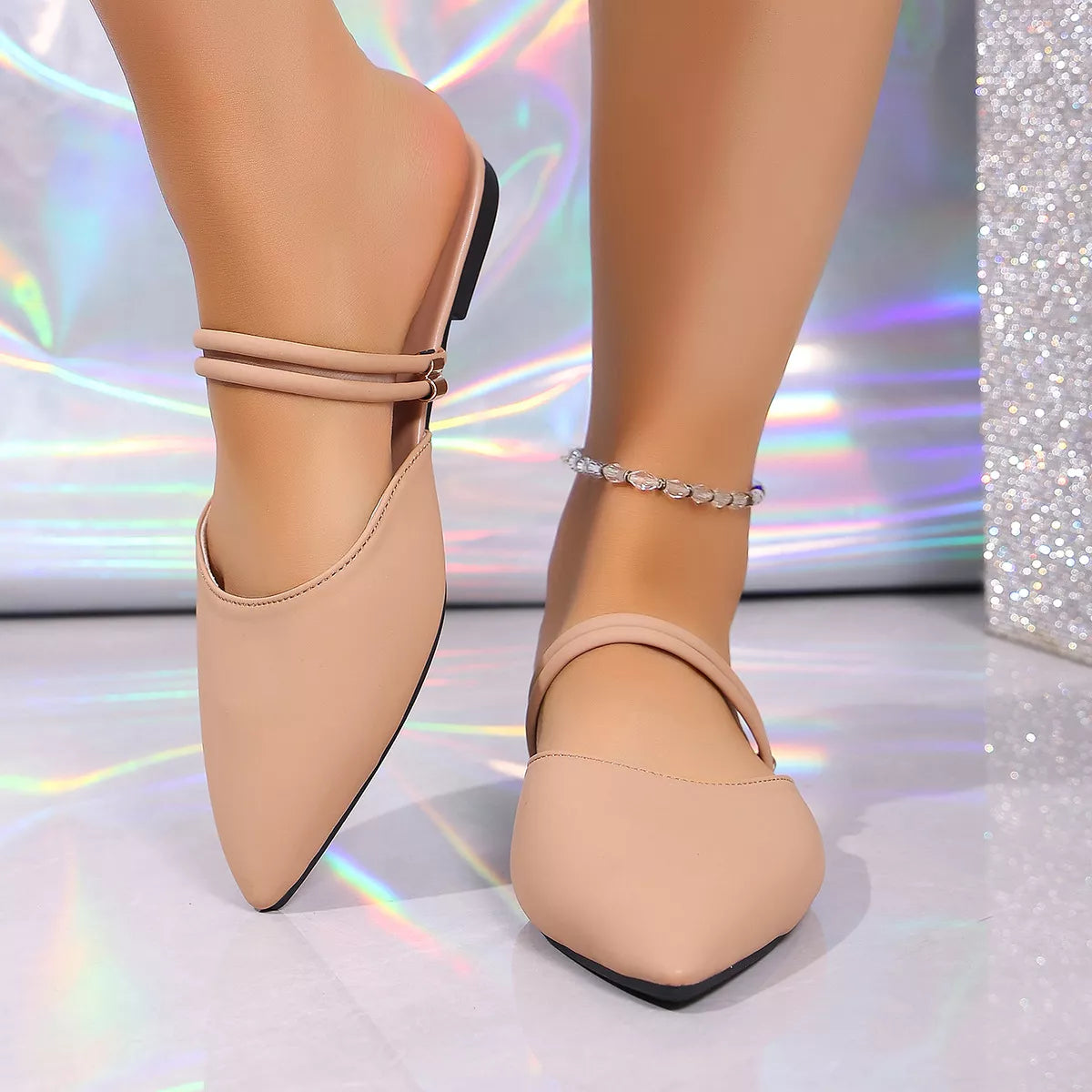Plush Fashion Hub point toe flat sandals with plush straps and sleek design, perfect for casual and stylish summer wear.