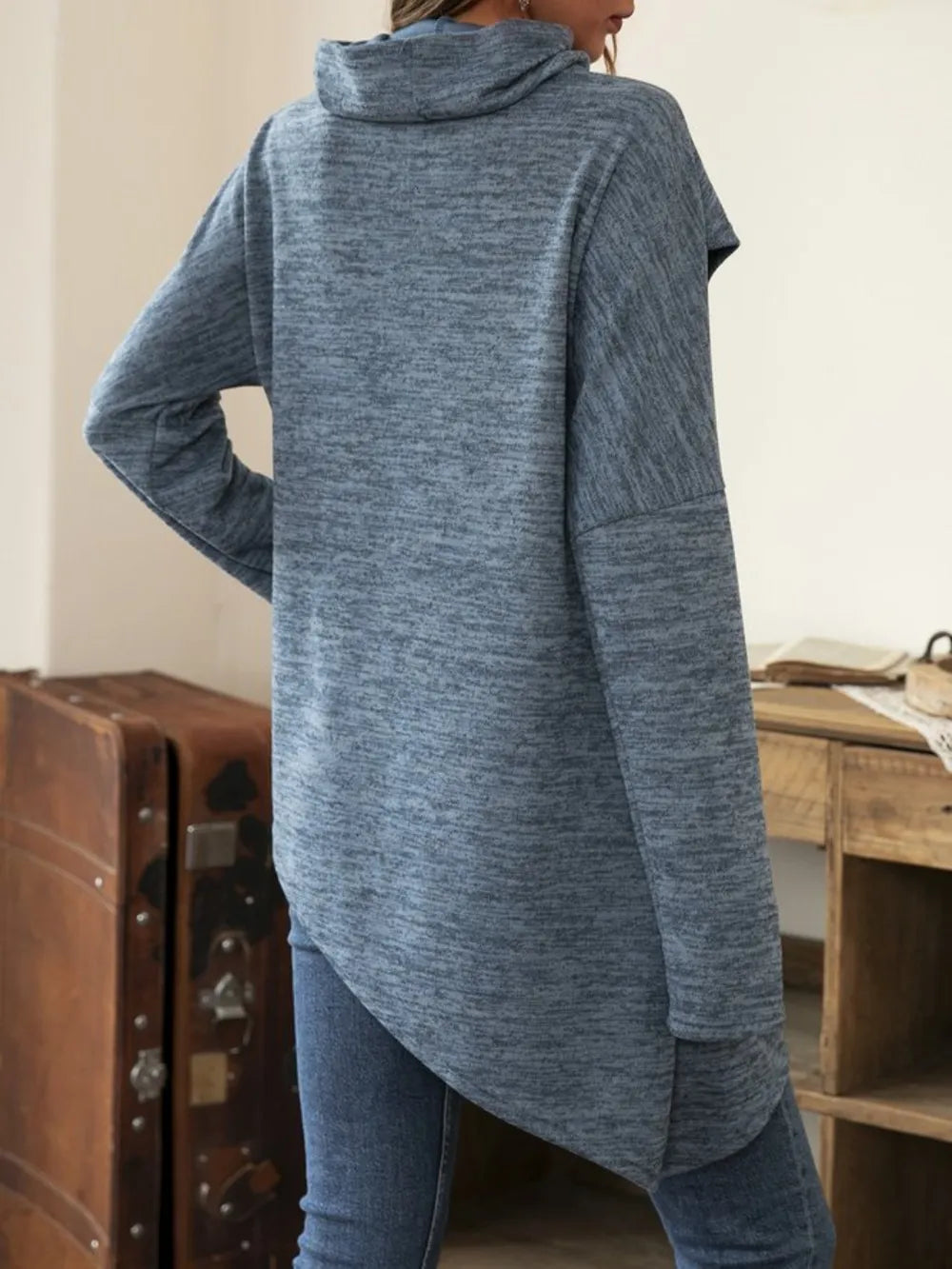 Long sleeve cowl neck t-shirt with asymmetrical hem from Plush Fashion Hub, showcasing soft fabric and stylish drape.