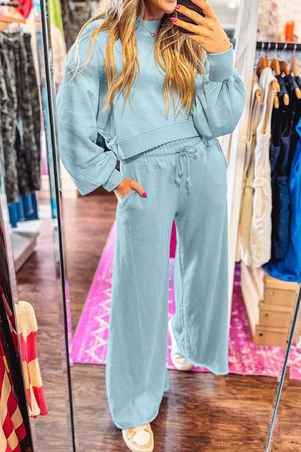 Drop shoulder puff sleeve crop pullover and wide-leg pants set from Trendsi, shown in a stylish coordinated outfit.