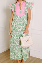 Floral midi dress with contrast trim and flutter sleeves from Trendsi, featuring a flowy design and vibrant floral pattern.
