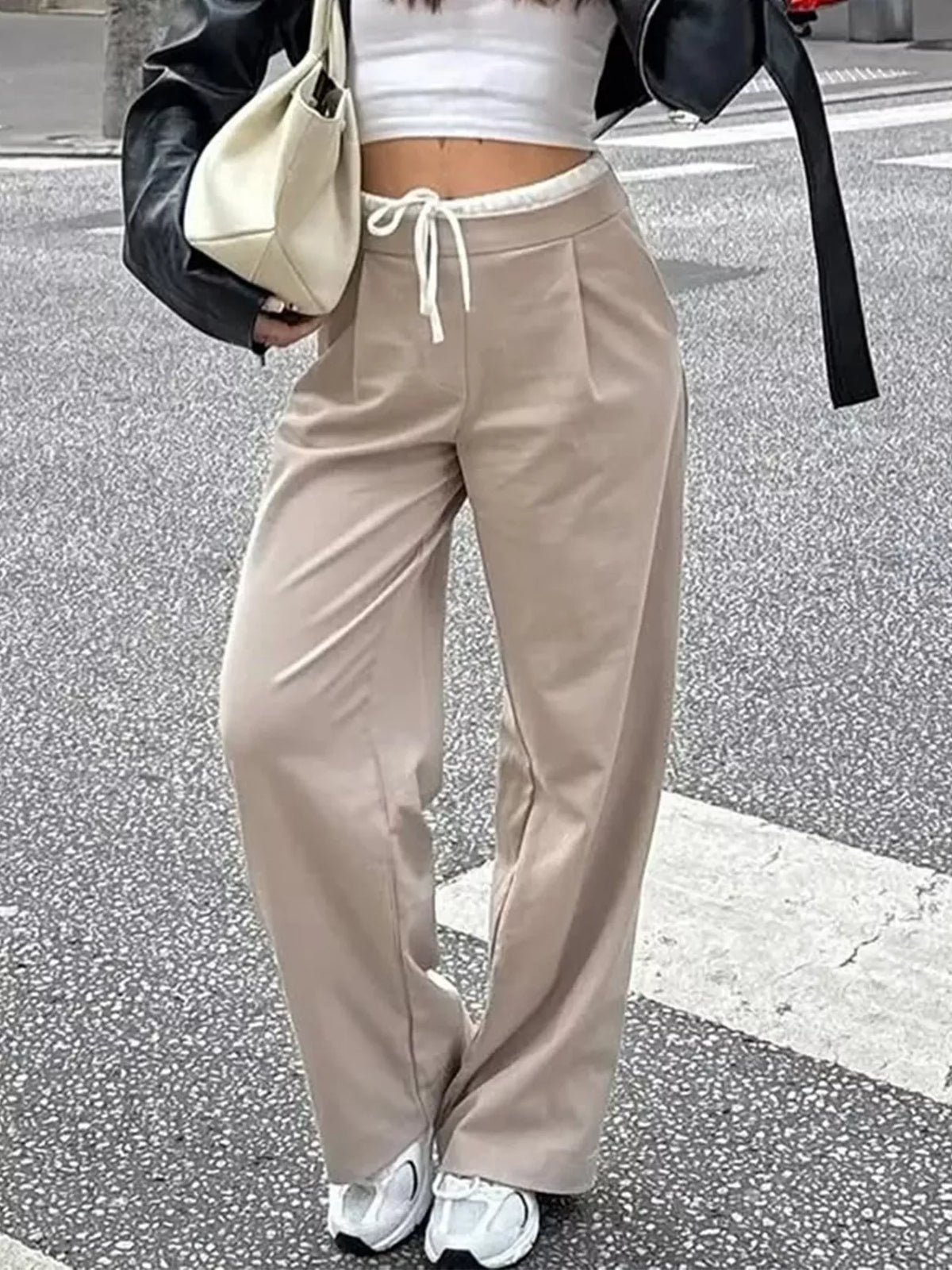 Plush Fashion Hub wide-leg pants with drawstring waist, soft plush fabric, and relaxed fit for comfortable, stylish casual wear.