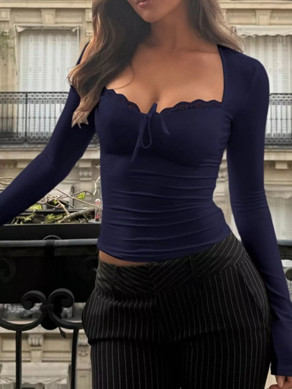 Plush Fashion Hub lace trim long sleeve T-shirt in soft fabric with delicate lace detailing on the sleeves, casual and stylish.
