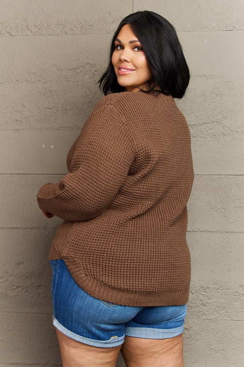 Plus size Zenana Breezy Days high-low waffle knit sweater with long sleeves and cozy texture, perfect for casual layered looks.