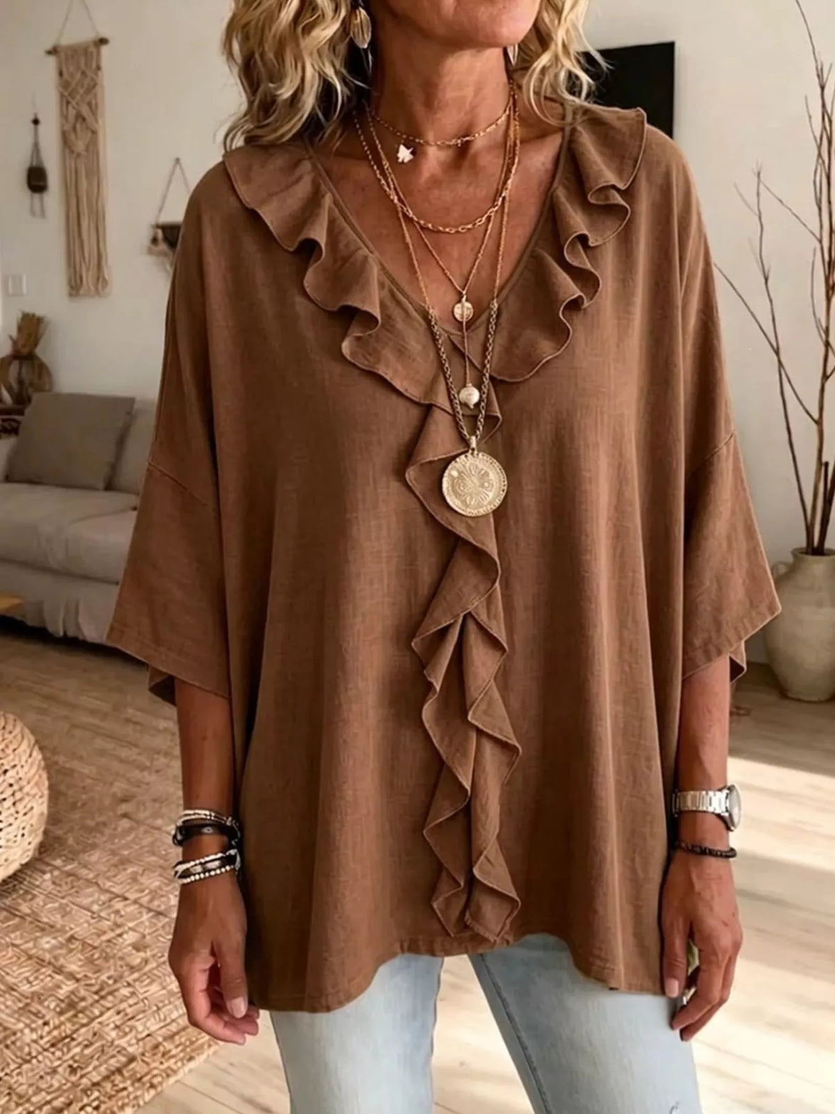 Plus size ruffle v-neck blouse with 3/4 sleeves from Plush Fashion Hub, featuring full ruffle details and a flattering fit.