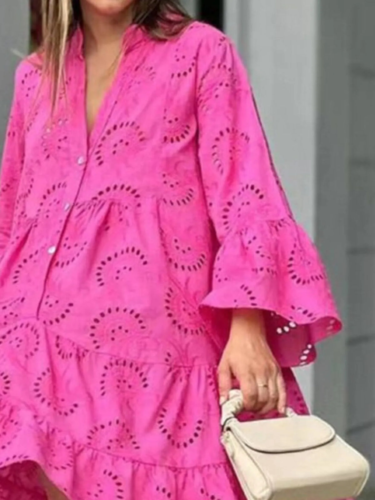 Full size eyelet ruffled hem tiered dress by Trendsi featuring a flowy silhouette and feminine details, perfect for casual wear.