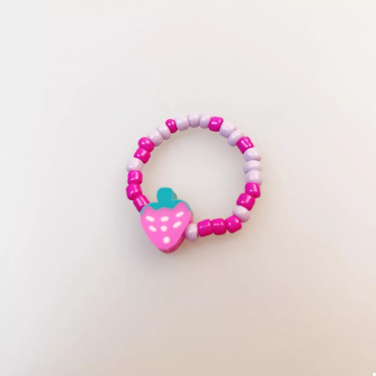 Colorful fruit charm beaded ring featuring vibrant fruit-shaped beads, designed by Plush Fashion Hub, for a playful, stylish look.