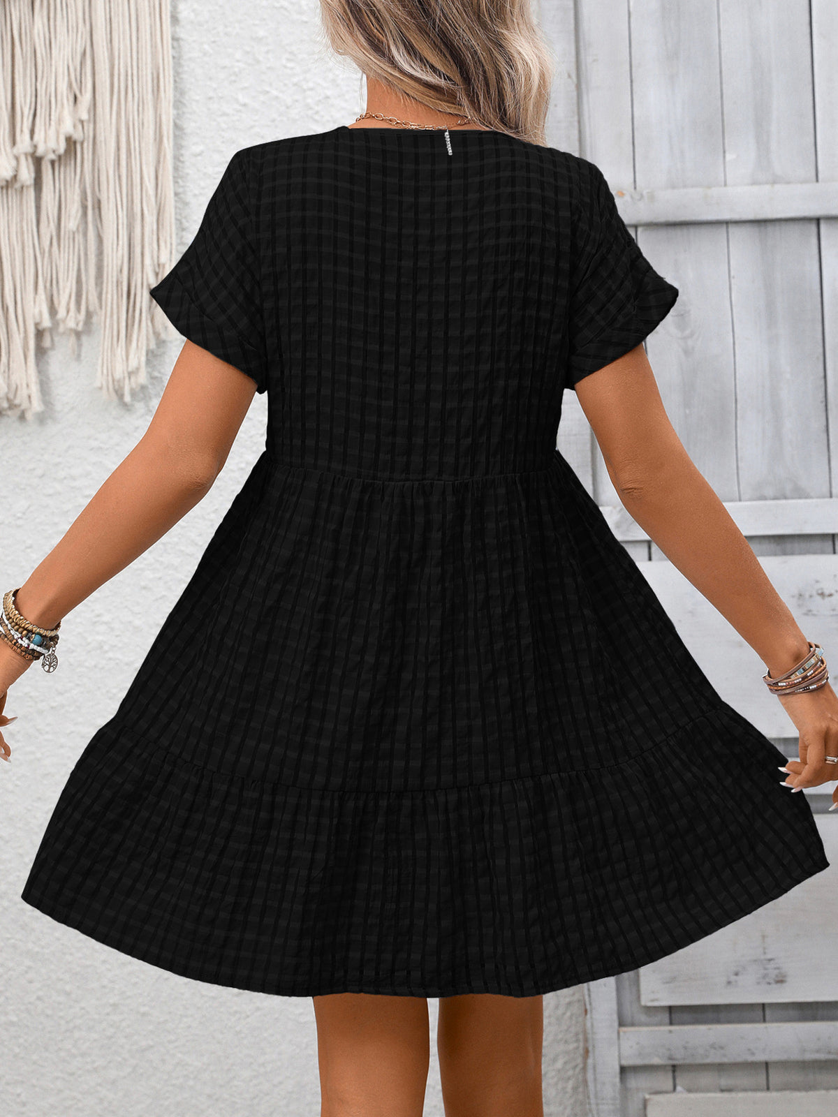 Plush Fashion Hub chic plaid V-neck mini dress with ruffle hem, stylish and trendy for casual or dressy occasions.