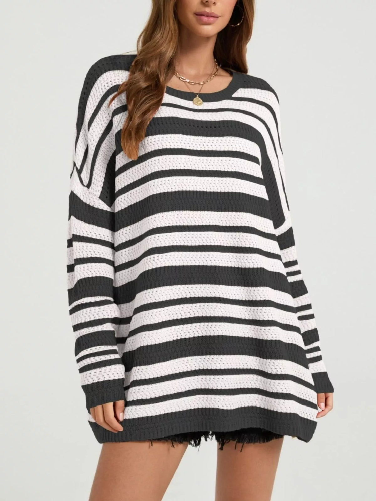Trendsi striped drop shoulder sweater for women with blue and white horizontal stripes, cozy knit fabric, and relaxed fit.