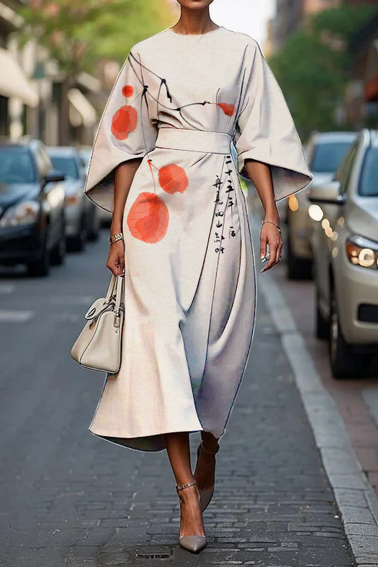 Flowy maxi dress with geometric print and batwing sleeves from Plush Fashion Hub, casualwear style in XS–XXXL size.