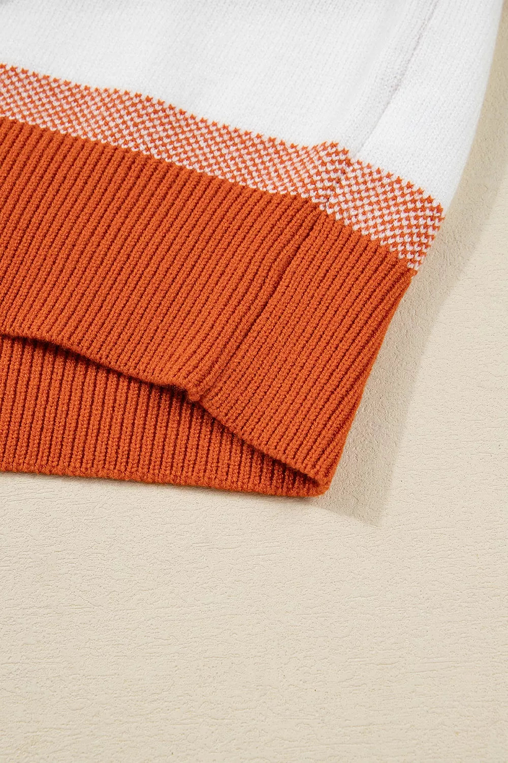 Color block round neck tunic sweater by Trendsi featuring bold color blocking and a cozy, relaxed fit in soft knit fabric.