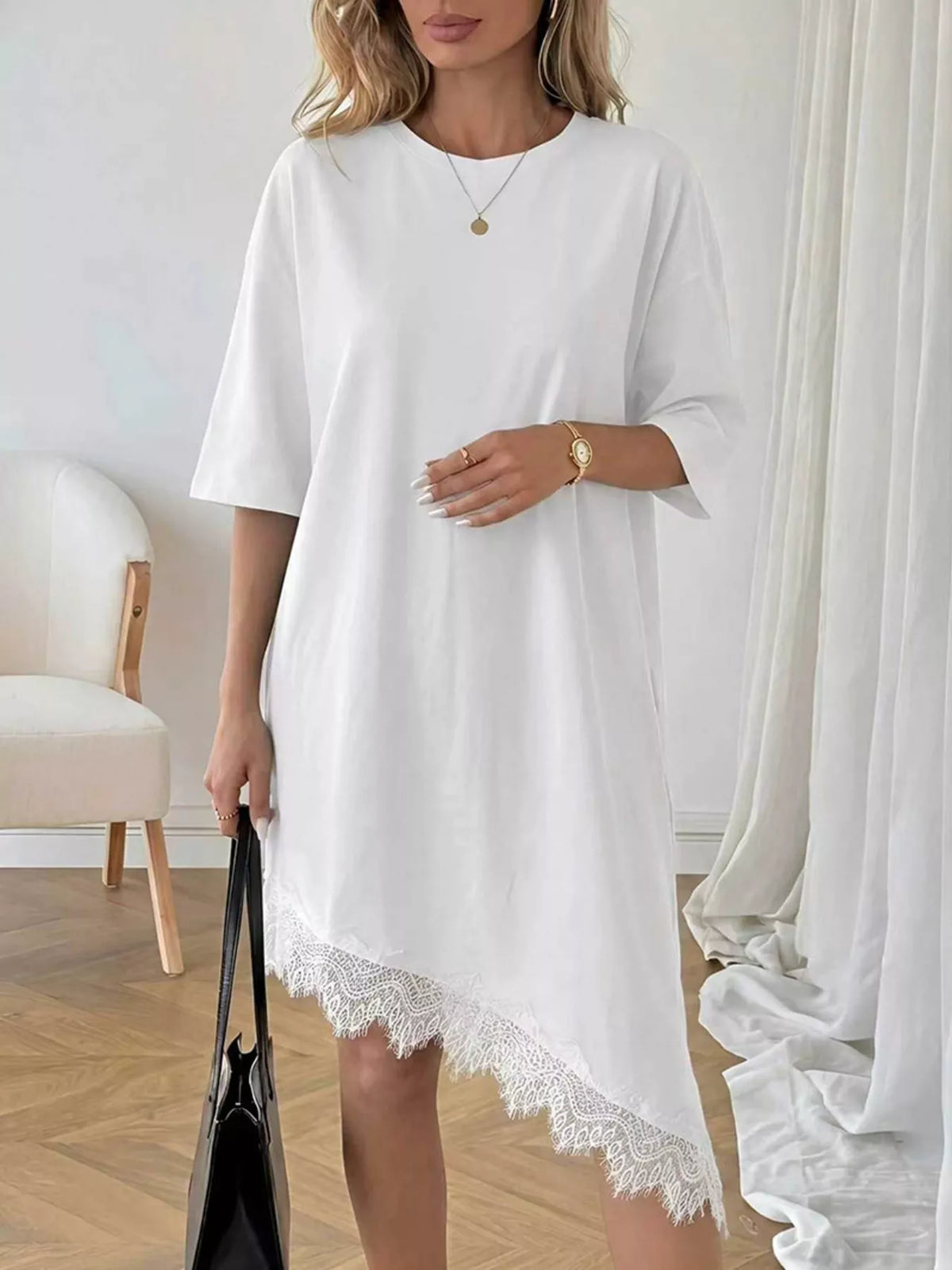 Lace trim asymmetrical hem T-shirt dress by Plush Fashion Hub, featuring a casual shirt dress style with decorative lace details.