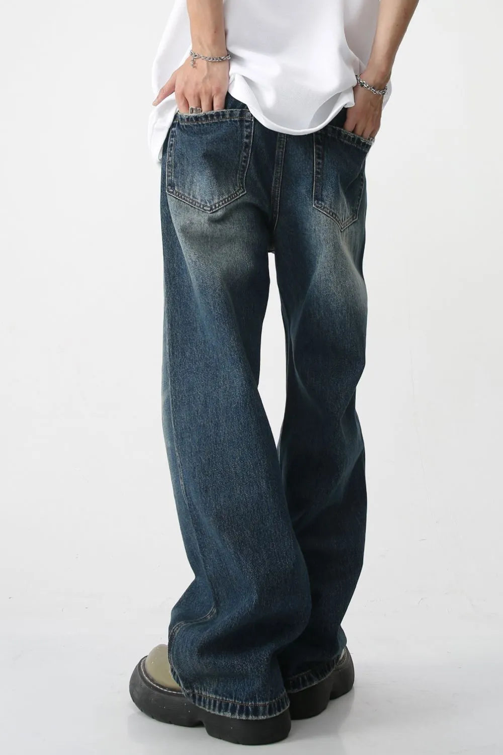 Plush Fashion Hub bootcut denim jeans with front and back pockets, classic blue color, and relaxed fit.