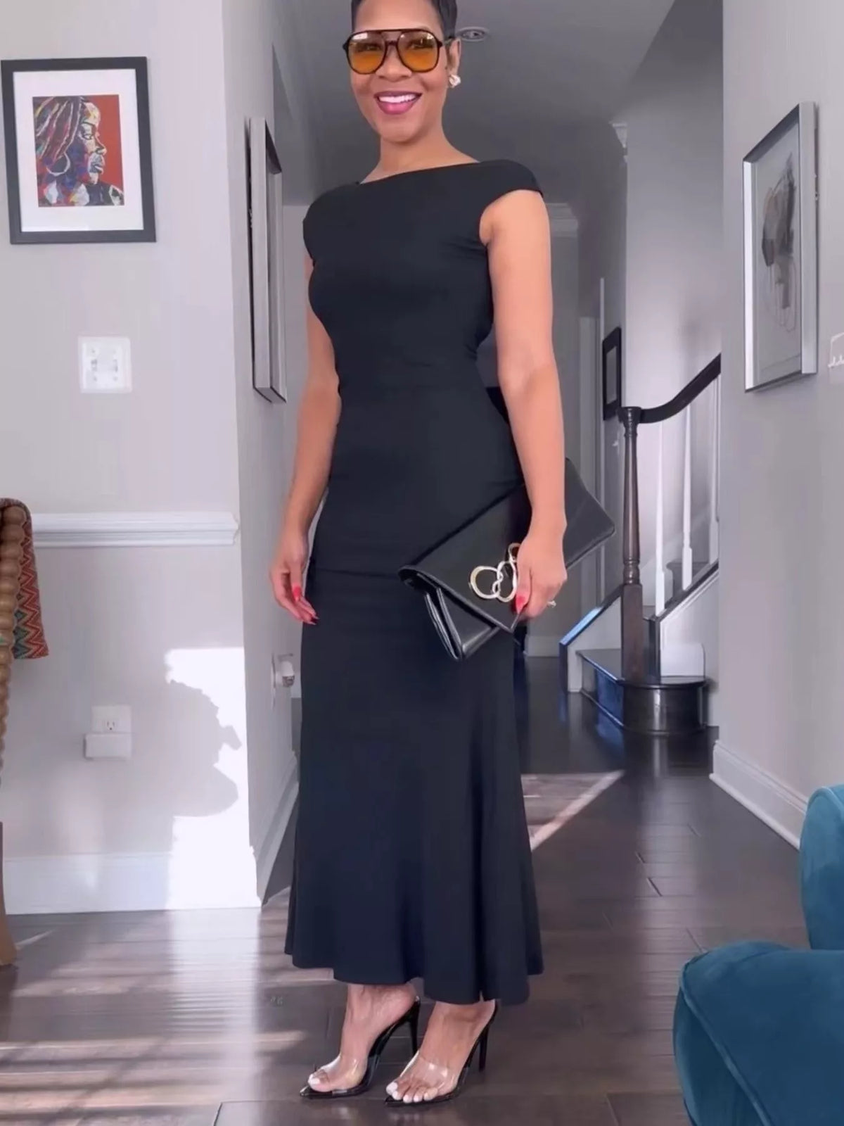 Plush Fashion Hub backless cap sleeve maxi dress with a flowing silhouette and elegant design, suitable for formal or casual occasions.
