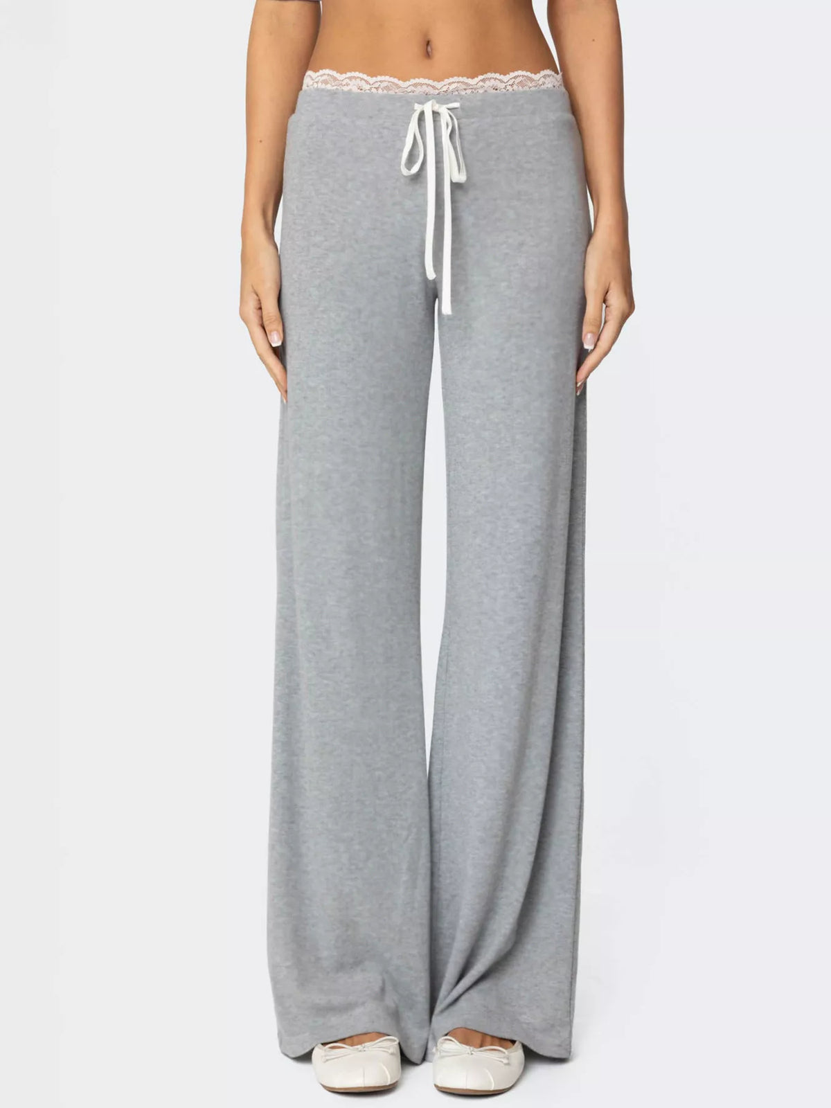 Women's wide leg lounge pants by Plush Fashion Hub with lace trim and tie waist, featuring a relaxed, elegant fit.