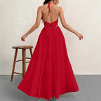 Backless halterneck v-neck pleated A-line dress for women by Plush Fashion Hub, shown on a hanger against a neutral background.