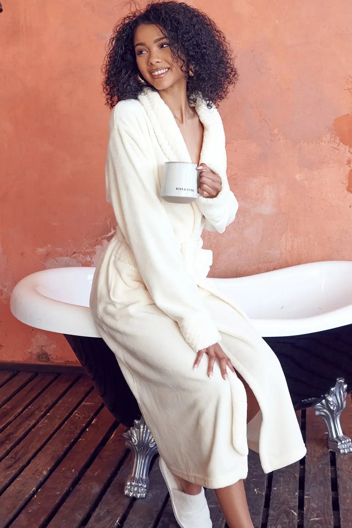 Soft plush women's bathrobe by Lotus Linen, showcasing a cozy, ultra-soft fleece robe with a relaxed fit and plush texture.