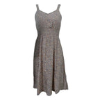 Floral backless A-line dress for women by FitiqueFit, casualwear with a flowy silhouette and vibrant floral pattern.