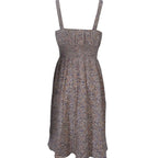 Floral backless A-line dress for women by FitiqueFit, featuring a casual style with a flowy silhouette and vibrant floral pattern.