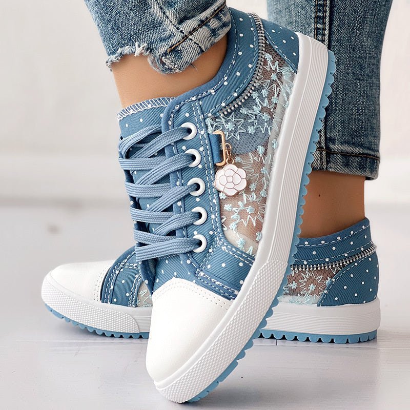 Women's floral embroidered polka dot canvas sneakers by FitiqueFit, casual footwear with colorful floral embroidery and polka dot pattern.