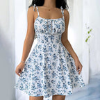 FitiqueFit floral mini dress with spaghetti straps, tie shoulders, and ruffle details for casual summer boho style.