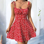 Floral mini dress by FitiqueFit featuring spaghetti straps, tie shoulders, and ruffle details, perfect for summer boho casual wear.