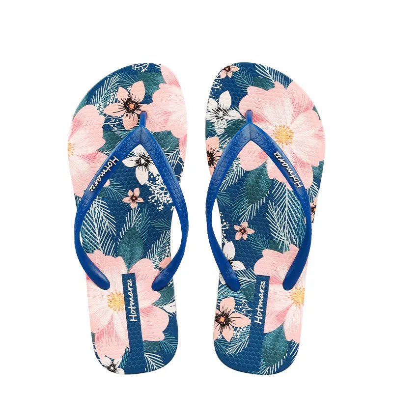 Women's floral print toe post flat sandals by Plush Fashion Hub, featuring colorful summer beach slide shoes with a floral design.