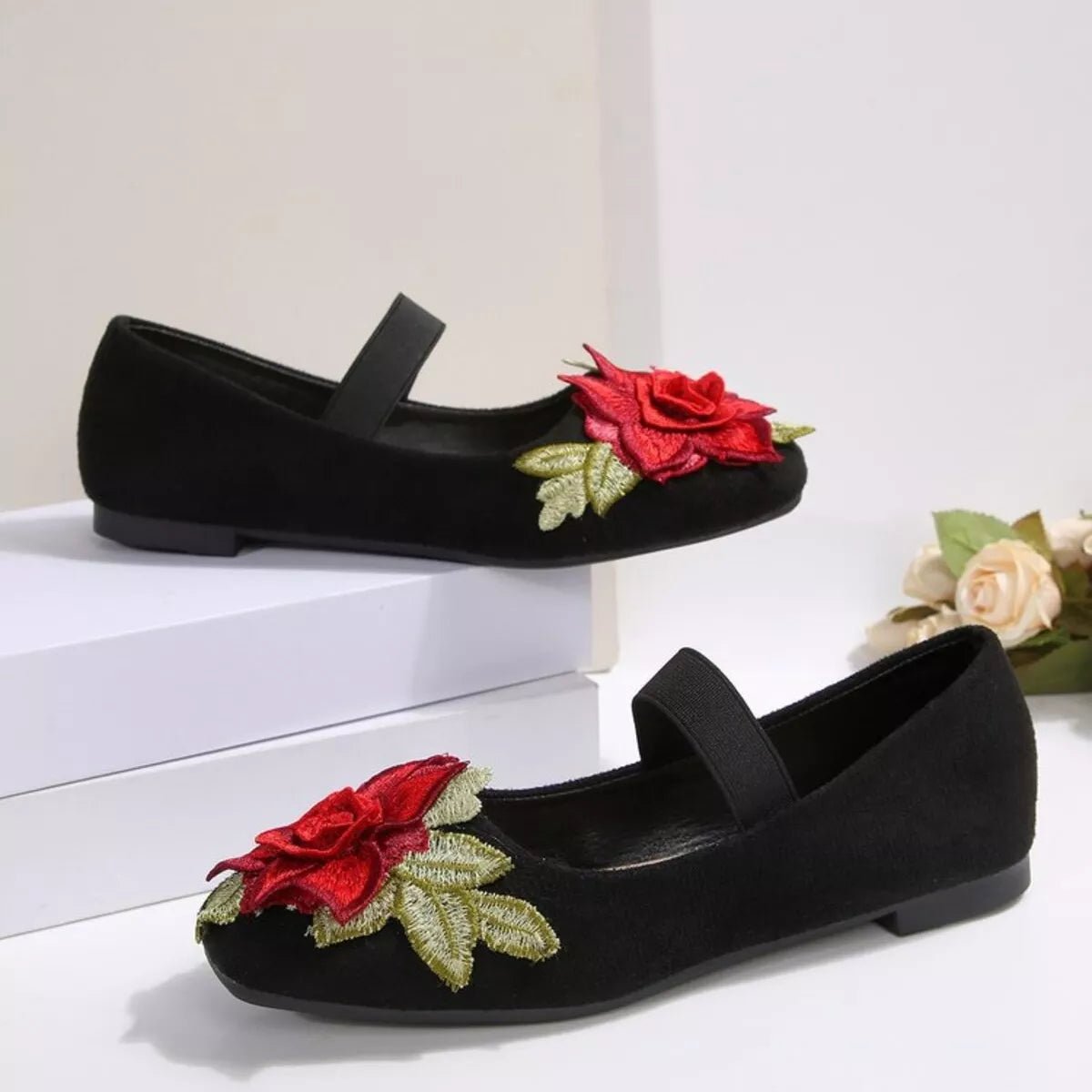 Women's floral square toe flat slip-on shoes by Plush Fashion Hub, featuring a colorful flower pattern and comfortable design.