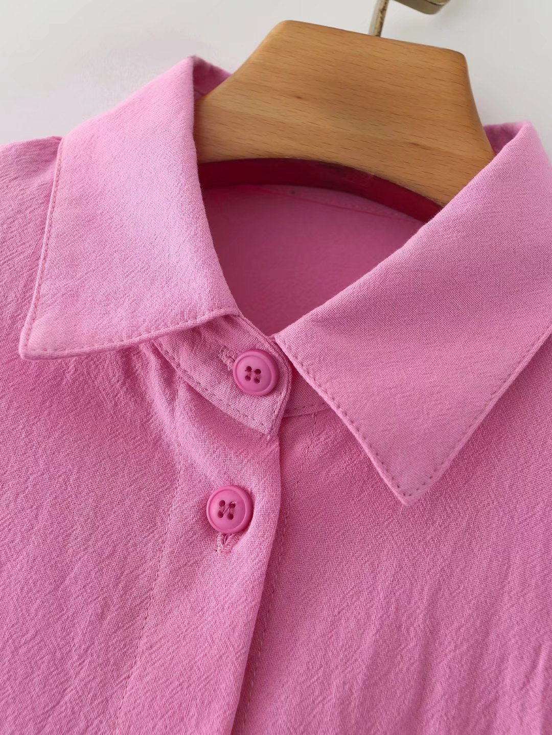Women's cotton long-sleeved shirt with polo collar, solid color, single-breasted design and lantern sleeves by Plush Fashion Hub.