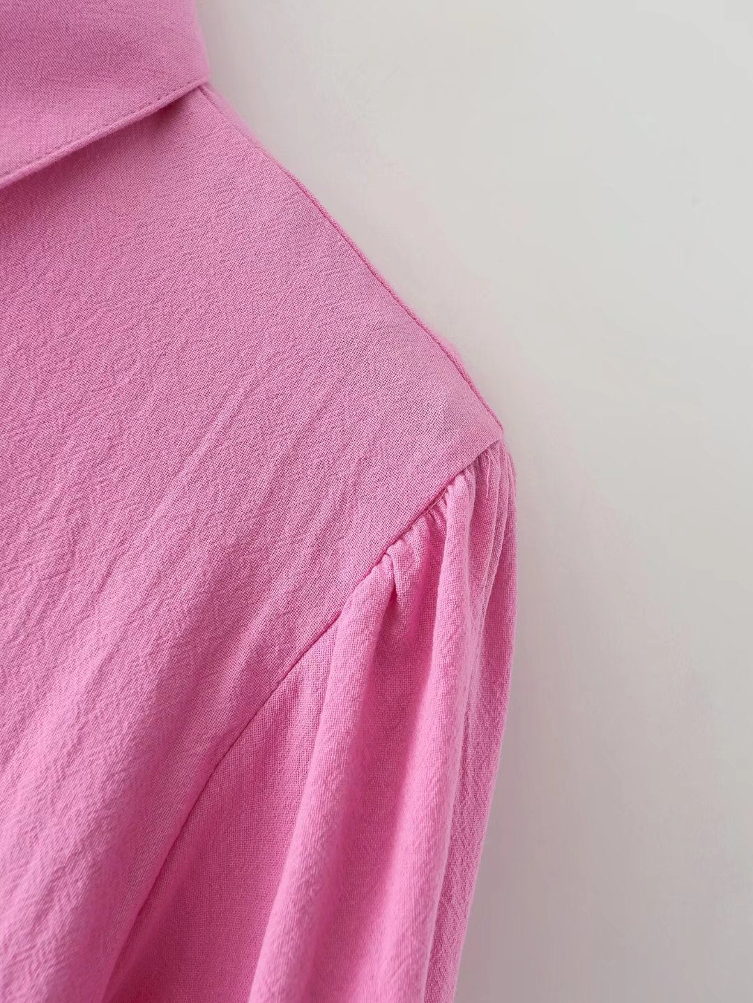 Plush Fashion Hub women's cotton long-sleeved shirt with polo collar, solid color, single-breasted design and lantern sleeves.
