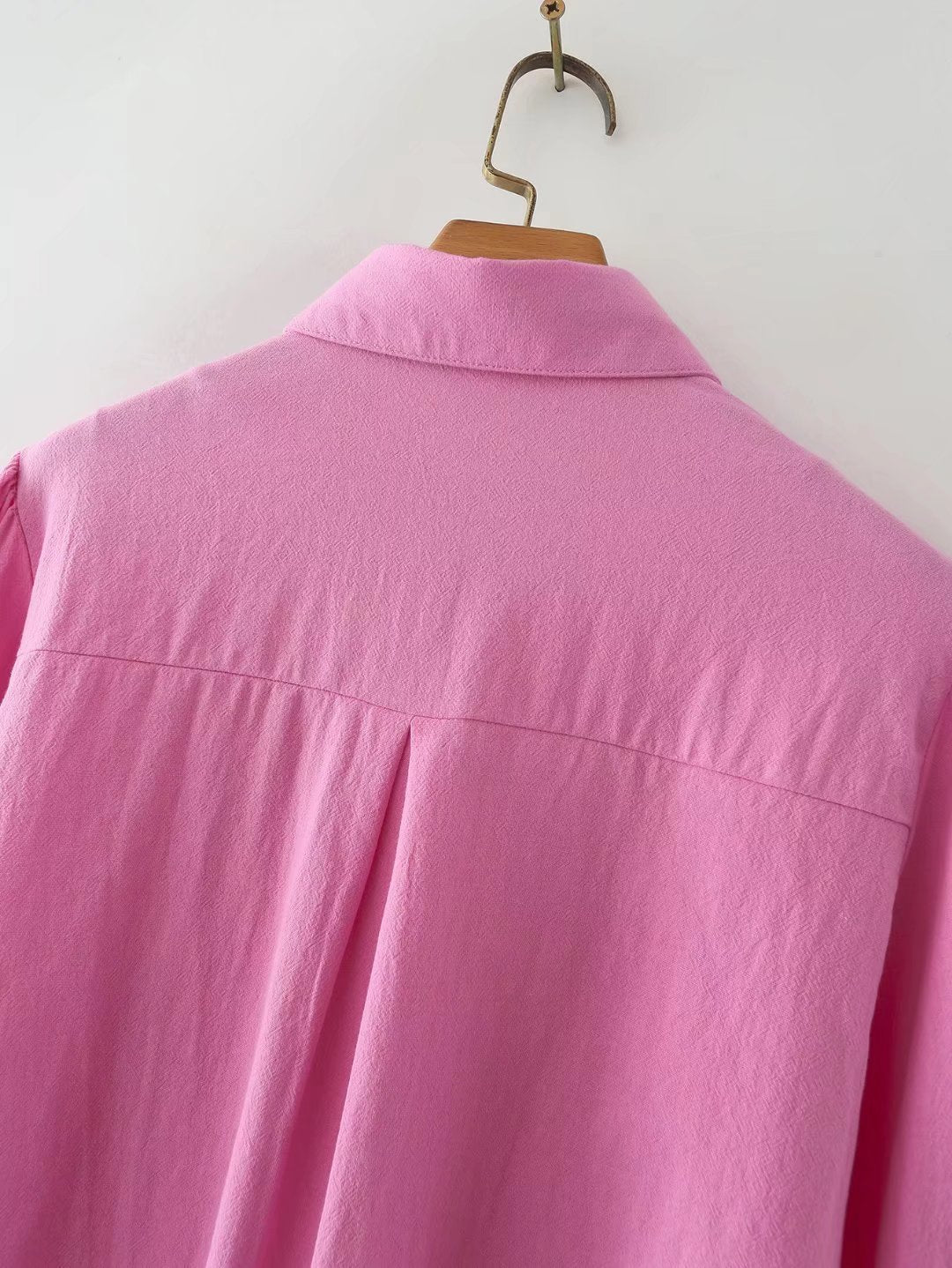 Plush Fashion Hub women's long-sleeved cotton shirt with polo collar, solid color, single-breasted, lantern sleeves.
