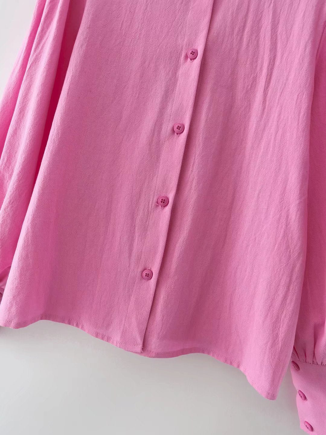 Women’s cotton long-sleeved shirt with polo collar, solid color, single-breasted design and lantern sleeves by Plush Fashion Hub.