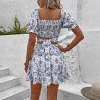 French-style floral print vacation set for women by FitiqueFit, featuring a casualwear outfit with a flowy top and matching shorts.