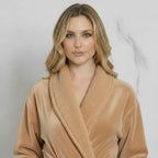 Front view of beige Lotus Linen women's ultra-soft plush bathrobe with a cozy, relaxed fit and belt tie.