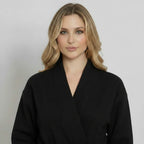 Black lightweight Lotus Linen women's waffle robe with front design, quick-dry spa comfort, perfect for lounging and relaxation.