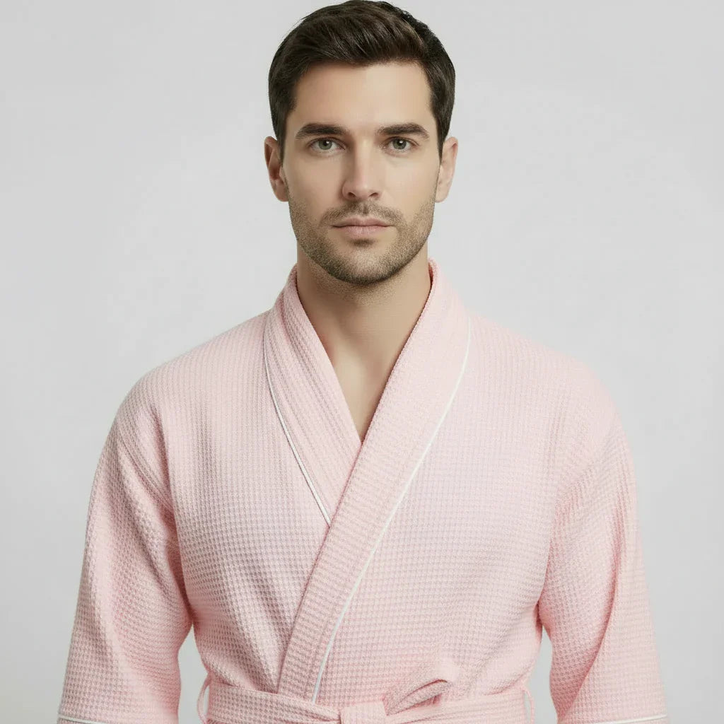 Front view of Lotus Linen men's premium waffle piping robe in blush with white piping, lightweight and cozy for home wear.