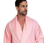 Front view of Lotus Linen men's premium waffle piping robe in blush with piping details, showcasing its cozy design.