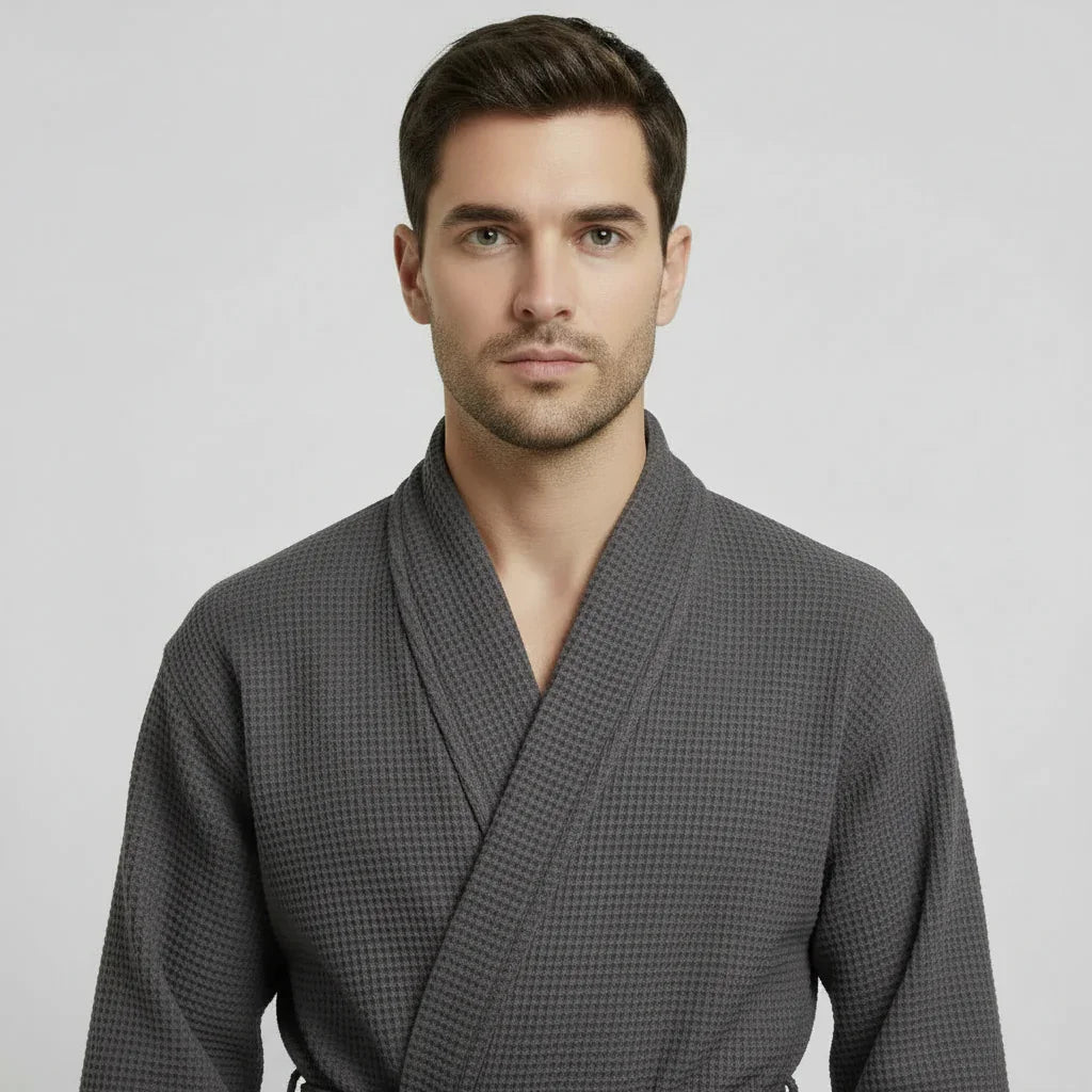 Front view of Lotus Linen men's waffle spa bathrobe in charcoal, lightweight and absorbent for comfortable relaxation.