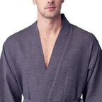 Front view of Lotus Linen men's charcoal waffle spa bathrobe, lightweight and absorbent, showcasing the soft fabric and relaxed fit.