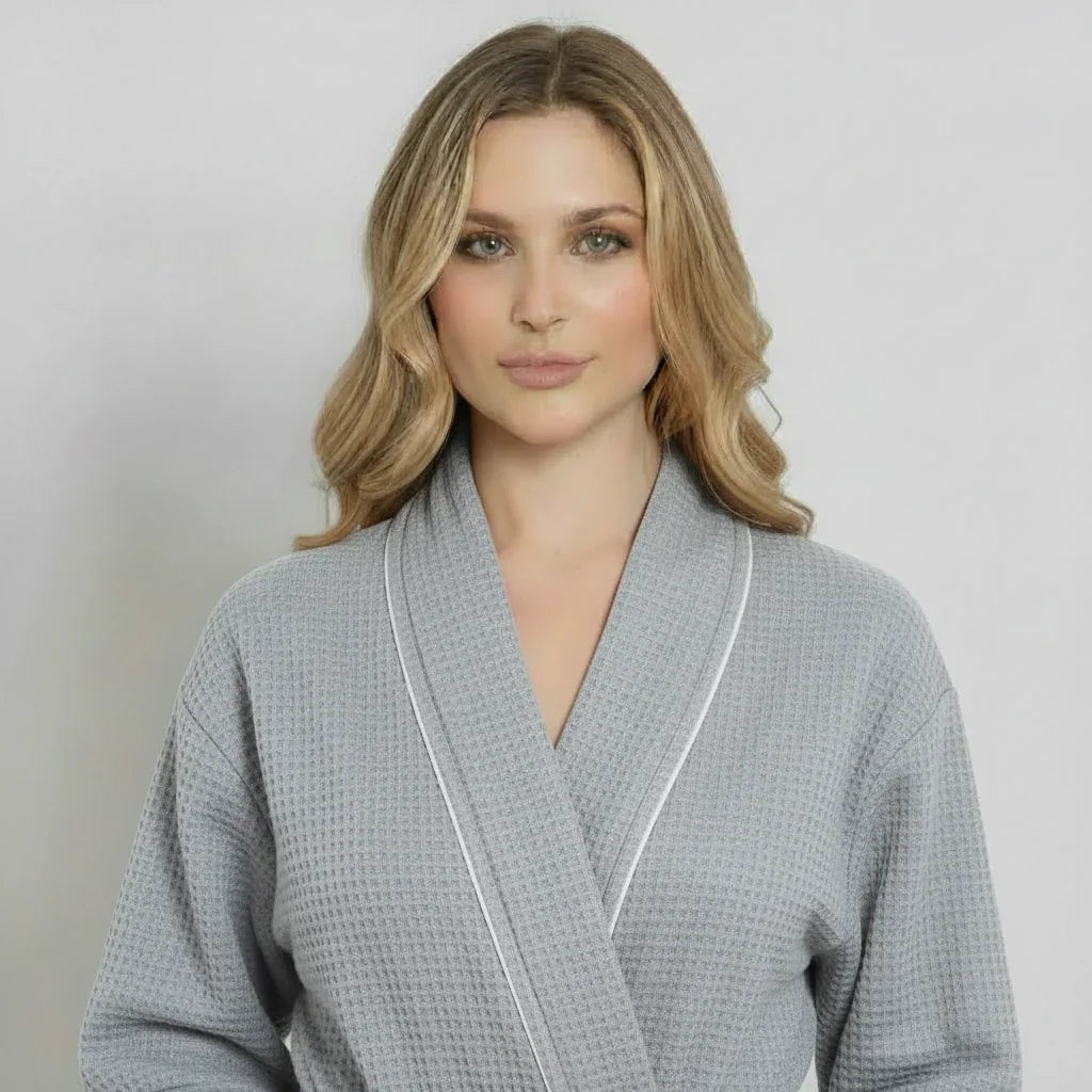 Front view of women’s gray waffle piping bathrobe by Lotus Linen, lightweight spa-style robe with piping details.