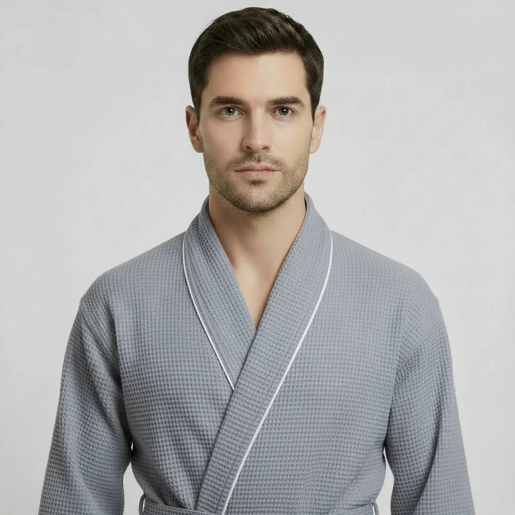 Front view of Lotus Linen men's premium waffle piping robe in small gray with contrasting piping details.