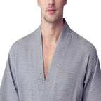 Front view of Lotus Linen men's waffle spa bathrobe in small grey, lightweight and absorbent for comfortable wear.