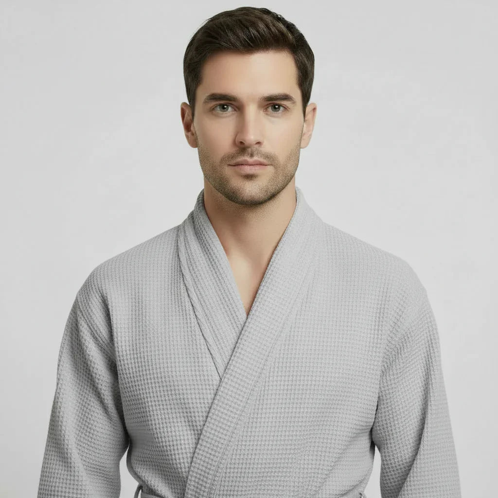 Front view of Lotus Linen men's waffle spa bathrobe in small grey, lightweight and absorbent for comfortable wear.