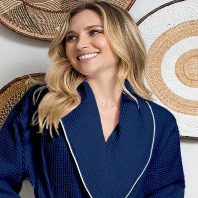 Navy women's waffle piping bathrobe by Lotus Linen, lightweight spa-style robe with front design and piping details.