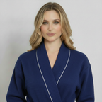 Navy knee-length waffle robe for women with piping, front view, lightweight and cozy Lotus Linen robe.