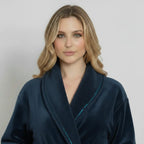 Front view of Lotus Linen women's navy ultra soft plush bathrobe with a cozy collar and tied waist.