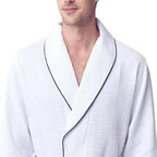 Front view of Lotus Linen men's premium waffle piping robe in small white with piping detail.