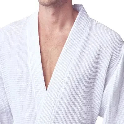 Front view of Lotus Linen men's waffle spa bathrobe in white, lightweight and absorbent for comfortable relaxation.
