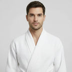Lotus Linen men's waffle spa bathrobe in white, lightweight and absorbent, shown from the front in a small image.