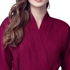 Women's lightweight waffle robe by Lotus Linen in wine red, featuring quick-dry spa comfort and a front view.