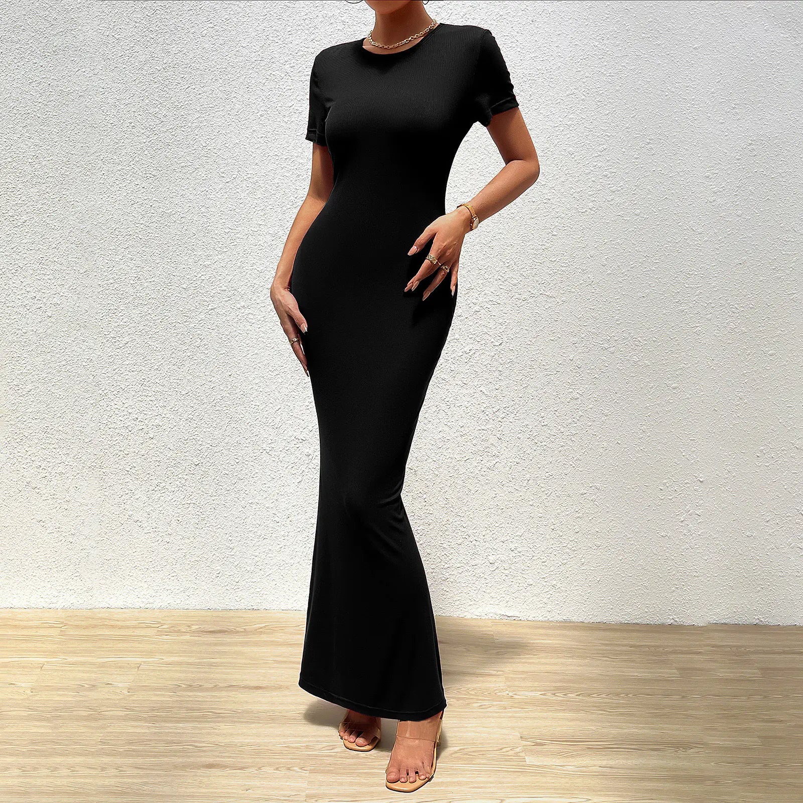 Elegant solid color slim fit round neck women's dress by Trendy Attic Store01, showcasing a stylish and form-fitting silhouette.